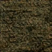 Brown and olive-green granular texture with matte finish, displaying irregular particles and subtle tonal variations; includes faint text “swan > fabric (h) > h 637”.